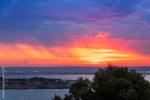 sunset in the city, mallorca, spain. beautiful sky and clouds