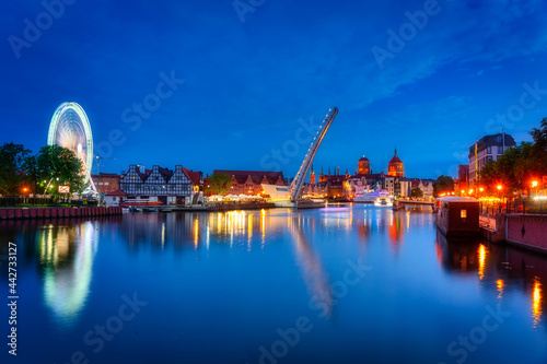 Beautiful scenery of Gdansk city at dusk over the Motlawa river. Poland