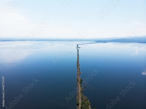 Aerial drone view of sea landscape with road