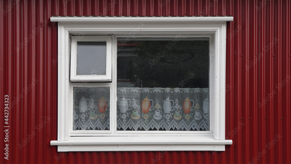 window with embroidered curtains, Isafjordur, Iceland