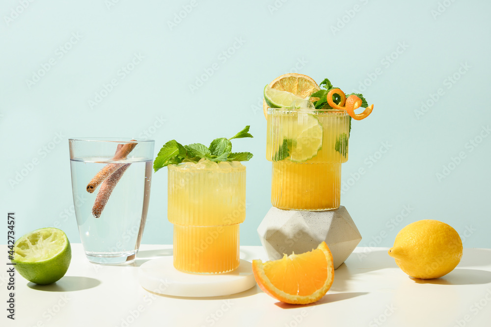 Classic cocktails, lemonade, mai tai, mojito with lime on modern still