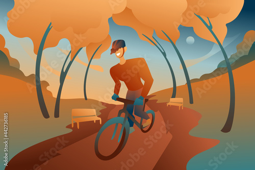 A young guy in a helmet rides a bicycle through a park with trees. A man on a bike in equipment is walking along the square against the background of an abstract flat background with clouds. 