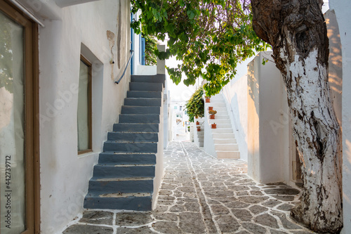 Fototapeta Naklejka Na Ścianę i Meble -  Paros island, Greece. Whitewashed buildings, narrow cobblestone streets