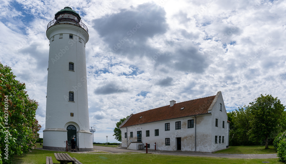 view of the Stevns Lighthouse on the east coast of Denmark on a beautiful summer day view of the Stevns Lighthouse on the east coast of Denmark on a beautiful summer day