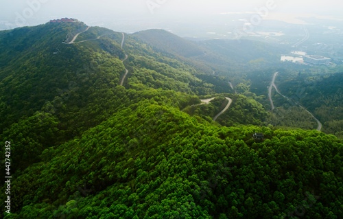 Aerial photography of the road between the beautiful valleys