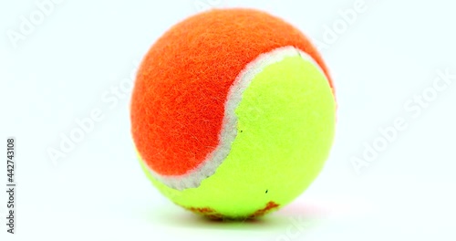 Tennis Ball Rotating Rotating Against A White Background, Close Up View, Macro Shot - DCi 4K Resolution