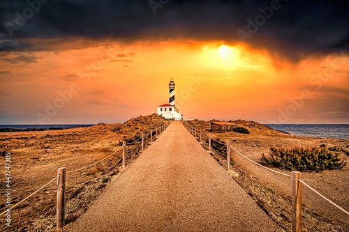 lighthouse on the coast of menorca island, spain