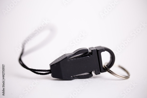 a black plastic lock is isolated on a white background