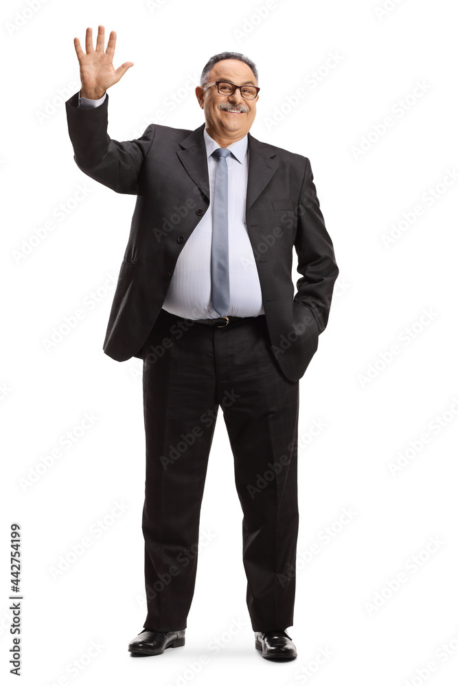 Full length portrait of a mature businessman waving hello Full length portrait of a mature businessman waving hello