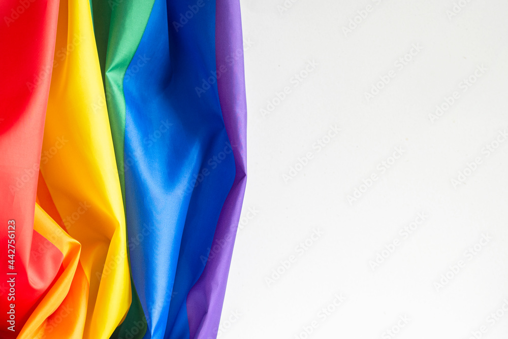 Rainbow flag on the wall, gay flag, concept picture, space for text