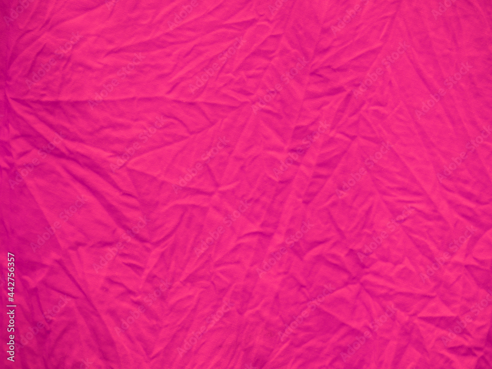 Pink color textile cloth texture with silk line presenting on background. Pink color textile cloth texture with silk line presenting on background.
