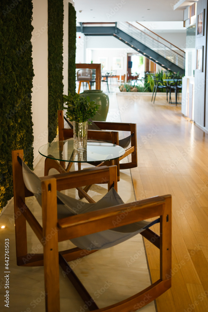 Obraz premium table and chairs in a restaurant