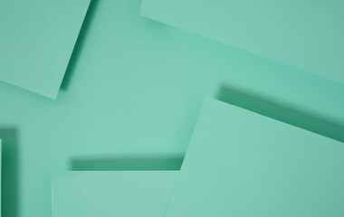 abstract pop up paper background in green. abstract arrangements build a geometric texture for wallpaper, posters, flyers, etc.