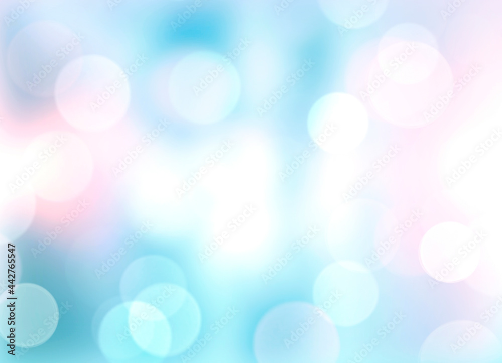Christmas blurred background.Pink blue defocused bokeh.Winter backdrop. Glowing abstract texture.
