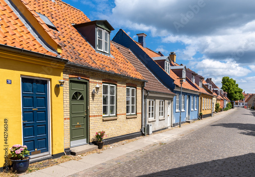 colorful houses and cobblestone street in the historic old town of Koge in Zealand