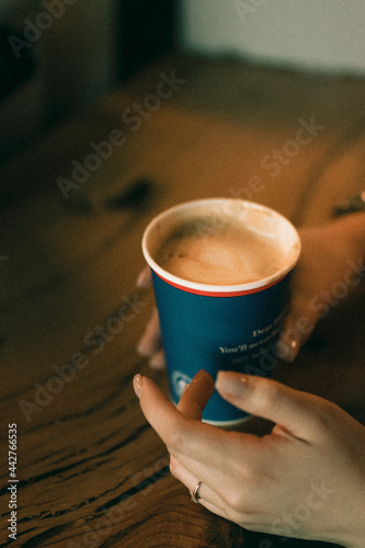 cup of coffee in hand
