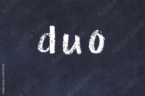 Foto College chalk desk with the word duo written on in