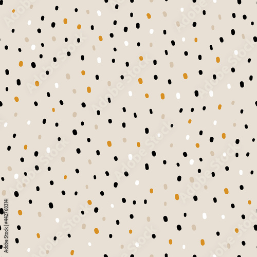 Vector abstract cute hand drawn seamless pattern with a irregular dots on a beige background. Pastel baby texture ideal for fabric, wallpaper, wrapping paper, card, layout. Delicate children's print.