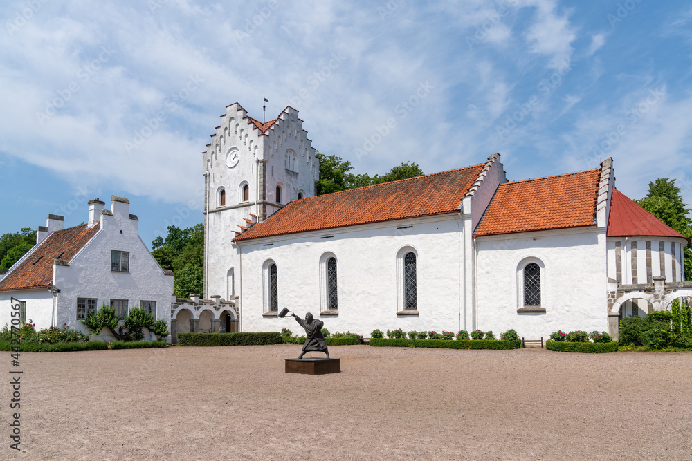 view of the castle courtyard and church at the historic Bosjokloster nunnery in southern Sweden