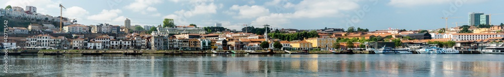 view of the skyline of maginal de Gaia along the Douro river.
