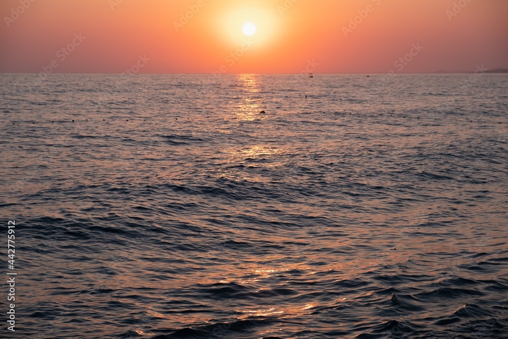 Sunset sea water sun light. reflection yellow