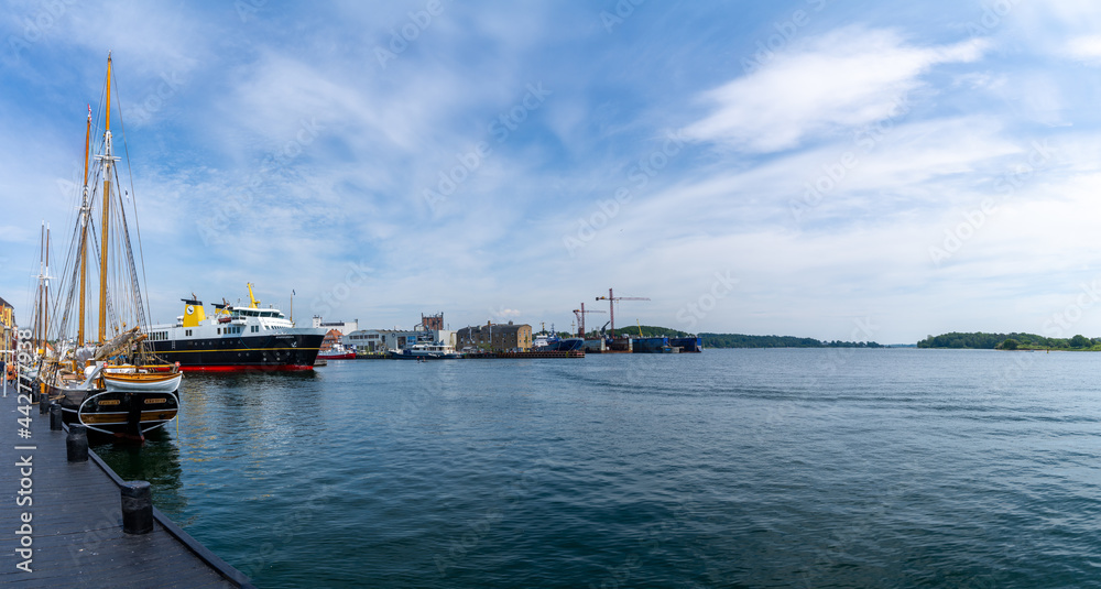 panorama view of the ferry docking at the ferry terminal in Svendborg before leaving for the island of Ærø