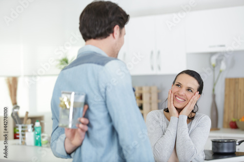 picture of happy man with gift for pregnant woman