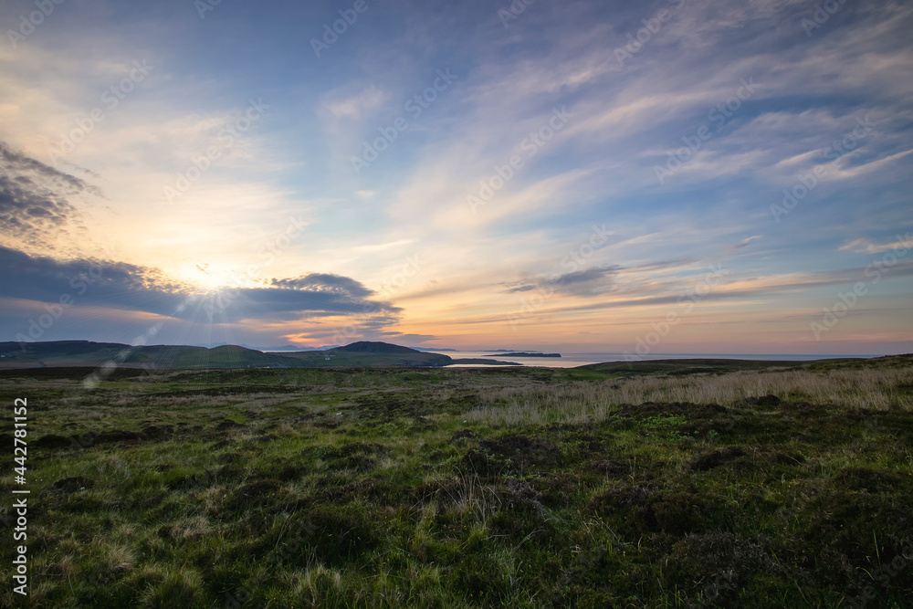 A stunning sunset on the Isle of Skye in the Scottish Highlands, UK