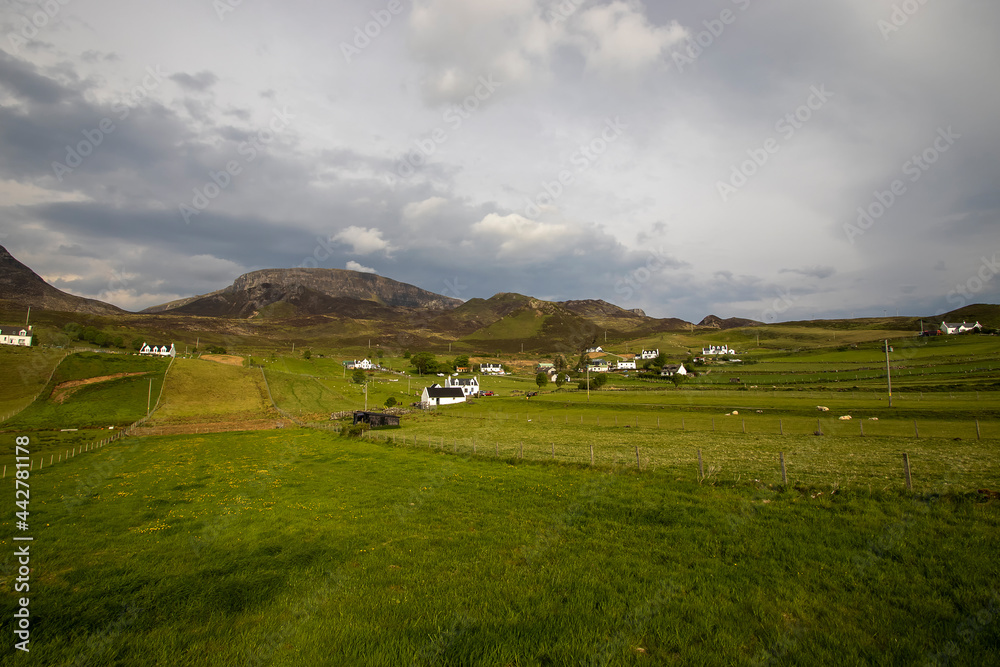 Rural homes on the Isle of Skye in the Scottish Highlands, UK Rural homes on the Isle of Skye in the Scottish Highlands, UK