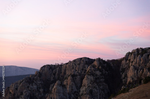 Evening mountain landscape, sunset pink-purple sky of Demerdzhi