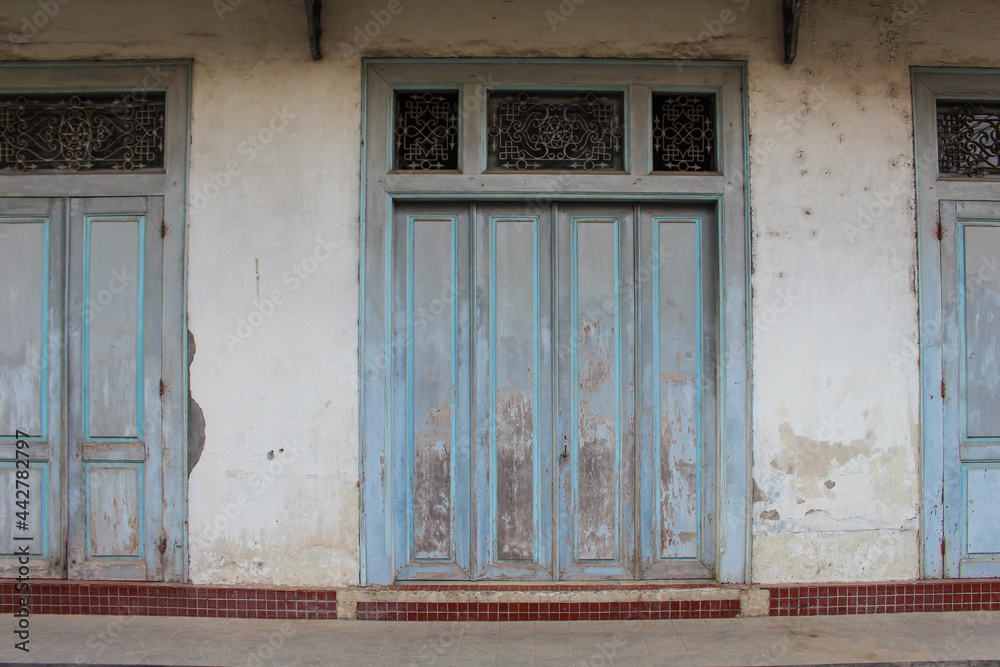blue door, an old building with classic style, in Kauman Batik Village Surakarta Indonesia