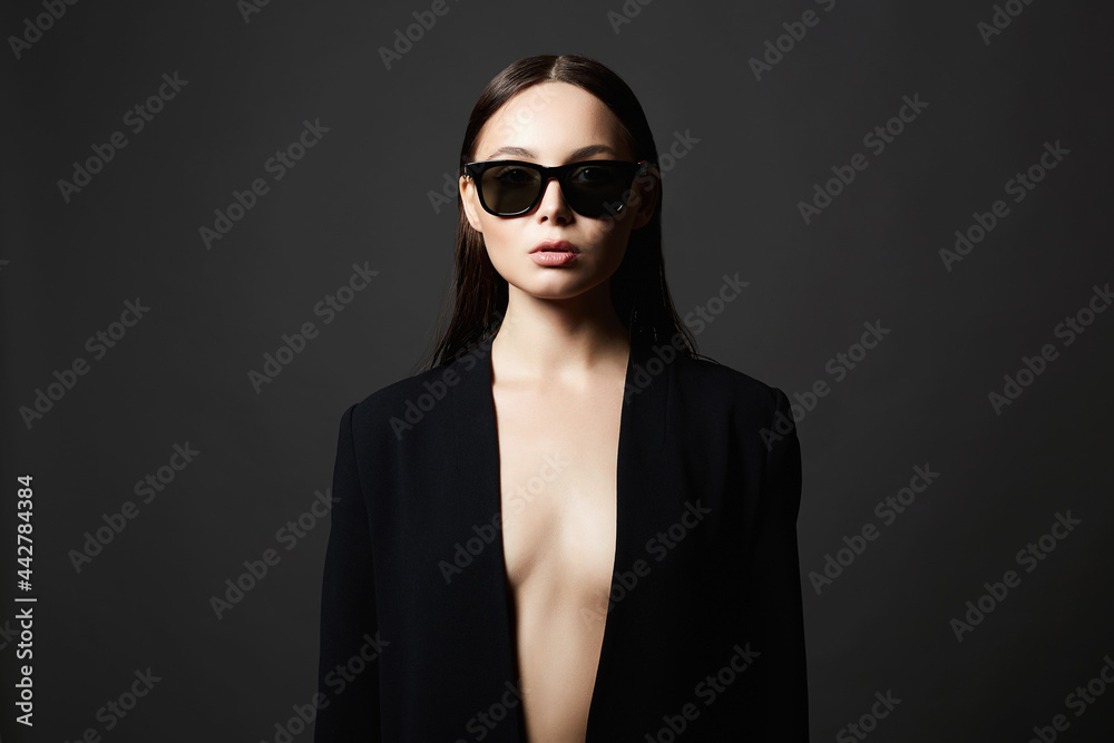 fashion portrait of Beautiful sexy woman in sunglasses fashion portrait of Beautiful sexy woman in sunglasses