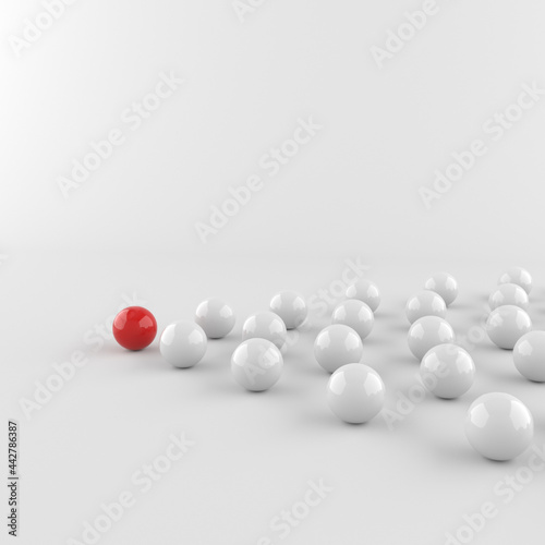 Leadership concept, red leader ball, standing out from the crowd of white balls. 3D Rendering © Vlad Chorniy