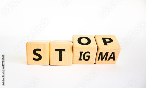 Stop stigma symbol. Turned wooden cubes with words stop stigma. Beautiful white background. Medical and stop stigma concept. Copy space. photo