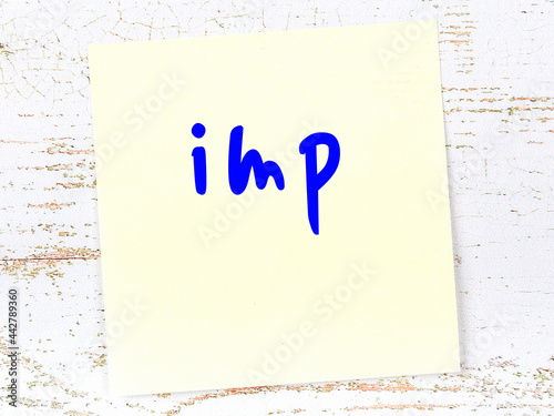 Yellow sheet of paper with word imp. Reminder concept photo