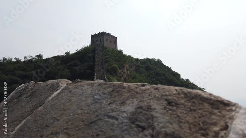 Walk over the Great Wall of China is a series of fortifications that were built across the historical northern borders of ancient Chinese states protection against various nomadic groups 4k quality photo