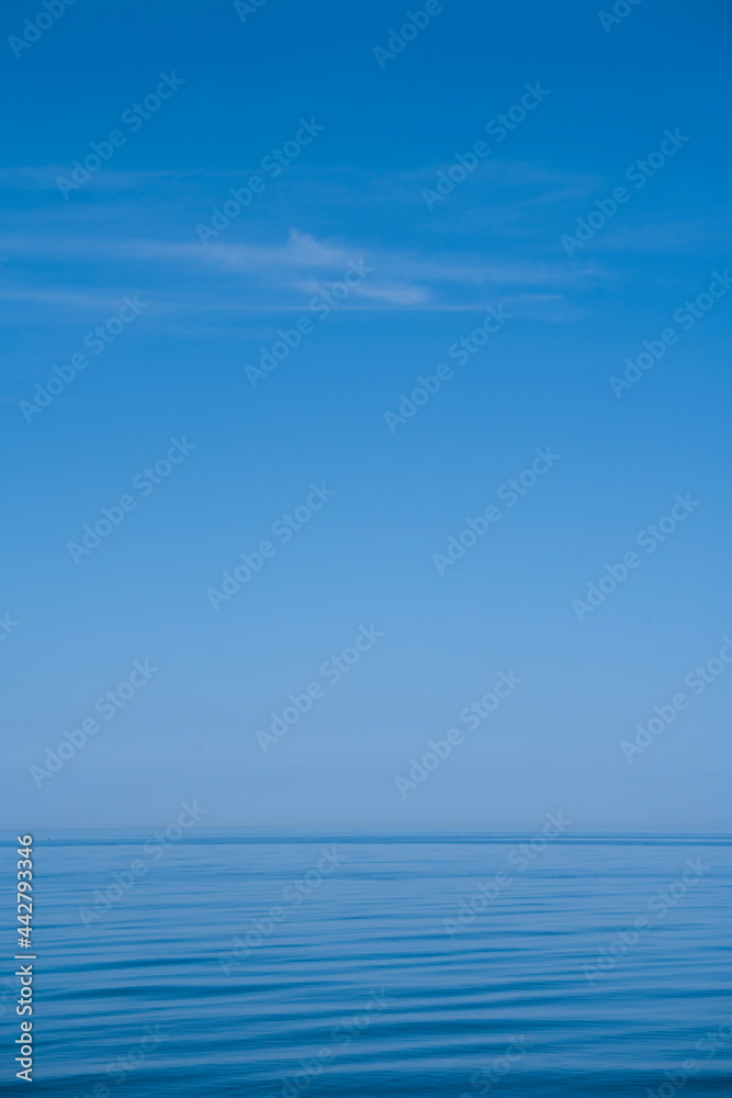 View on clear blue sky and sea 