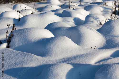 hummocks in the swamp large drifts after snowfalls