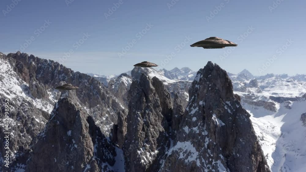Flying Saucers Ufo Hovering Above The Alps Peak, Aerial
alien invasion Concept in Europe Mountains, Drone view
Flying Saucers Ufo Hovering Above The Alps Peak, Aerial
alien invasion Concept in Europe Mountains, Drone view