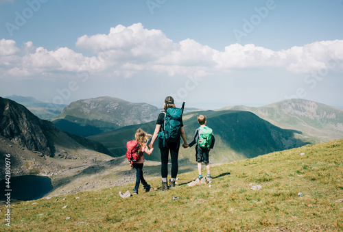 mom taking a moment with her kids to enjoy the view of Mount Snowdon photo