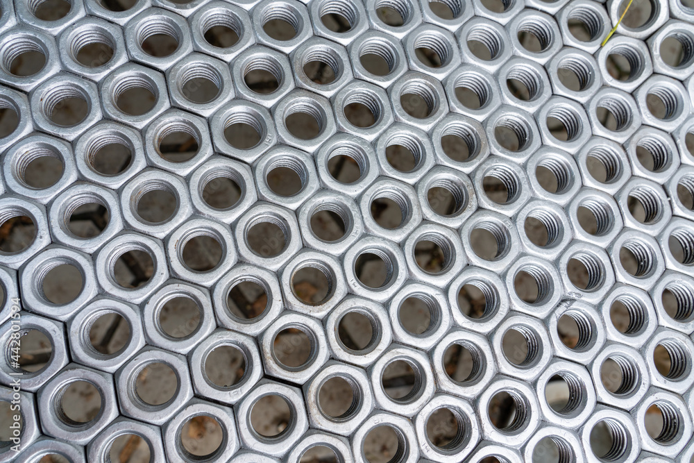 industrial texture made of stainless nuts industrial texture made of stainless nuts