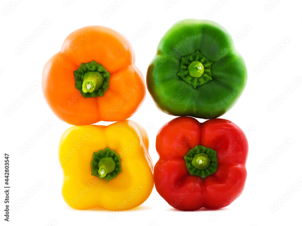 Orange, green, red and yellow bell peppers (paprika)