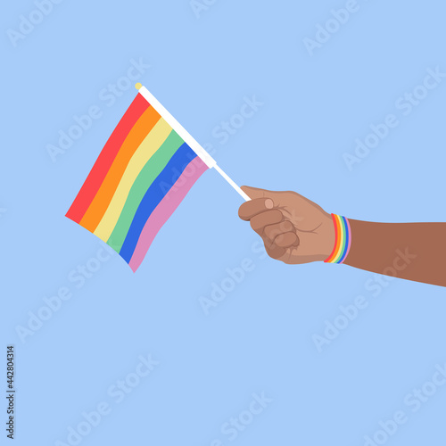  vector illustration hand holding LGBT flag, same-sex love concept