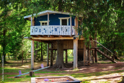 Children's treehouse in forest. Ecological Playground.  happy summertime in countryside