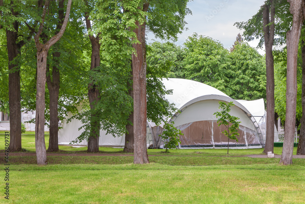 White large luxury glamping tent glamping for sustainable living green tree countryside