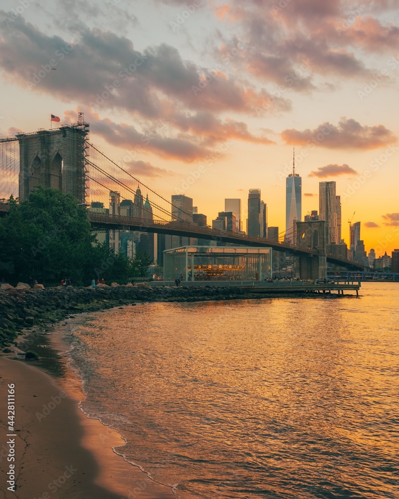 The Brooklyn Bridge and Manhattan skyline at sunset, from Dumbo, Brooklyn, New York