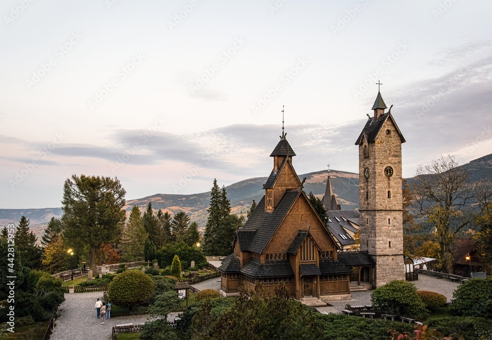 Fototapeta premium Old wooden Church against the backdrop of the Polish mountains