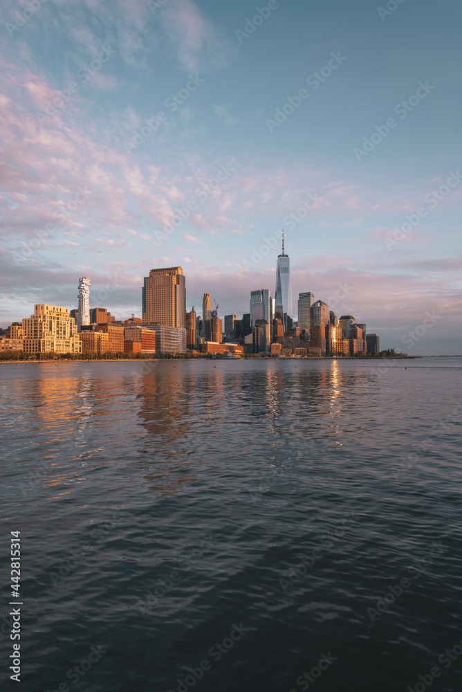 New York City skyline and Hudson River at sunset, Financial District, Manhattan, New York