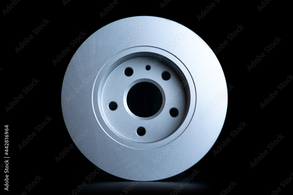 Auto equipment. Auto motor mechanic spare or automotive piece on black background. New metal car part. Repair and vehicle service with space for text. Auto equipment. Auto motor mechanic spare or automotive piece on black background. New metal car part. Repair and vehicle service with space for text.