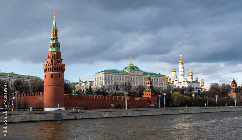 The Grand Kremlin Palace, Ivan the Great Bell Tower and the Moscow Kremlin towers on a sunny spring evening.